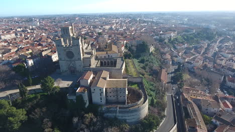 Béziers-Cathedral-with-the-city-in-background-aerial-drone-view-sunny-day-blue